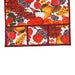 A close-up view of the fruit-patterned refrigerator top cover, highlighting the pocket details and fabric texture.